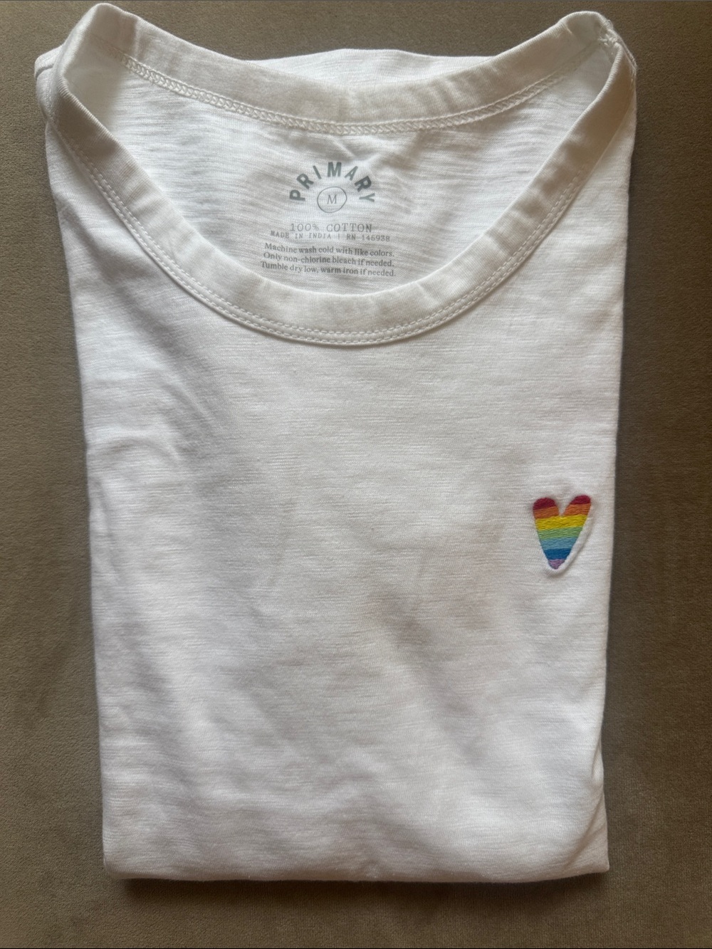 Primary White Tee with Rainbow Heart Patch women’s size medium